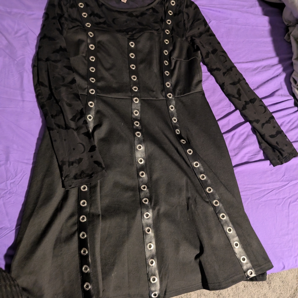 Elegant Black Dress with Eyelet Detailing